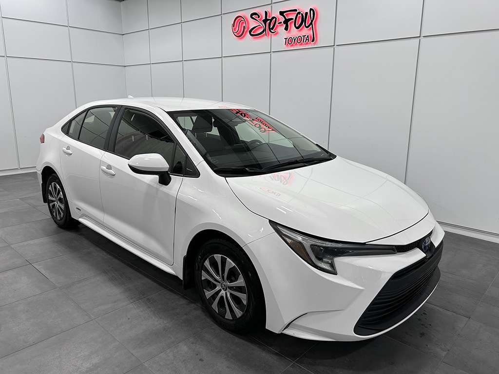 White 2023 Toyota Corolla Hybrid LE AWD Sedan All-Wheel Drive Continuously Variable Transmission