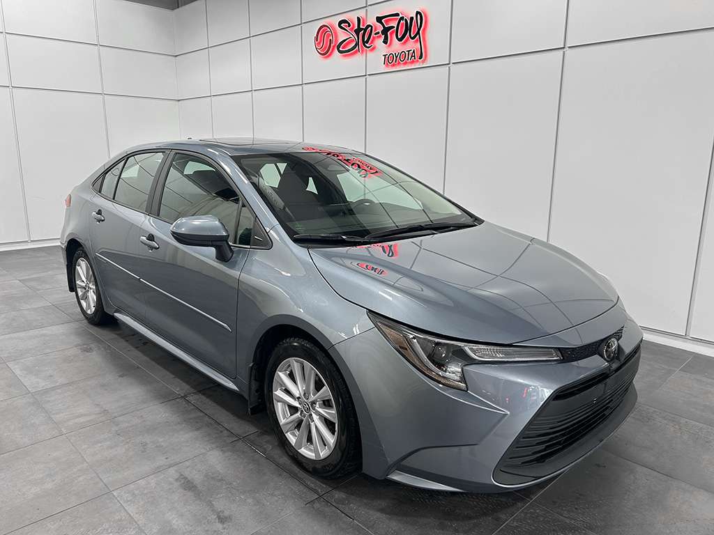 Blue (Bleu pâle) 2023 Toyota Corolla LE FWD Sedan Front-Wheel Drive Continuously Variable Transmission